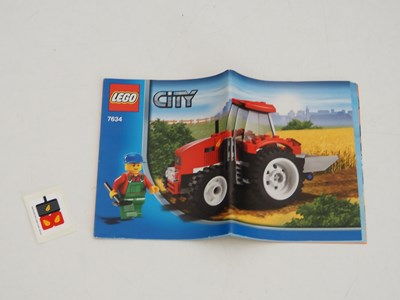 Lot 41 - A pair of LEGO CITY Tractors comprising 4899...