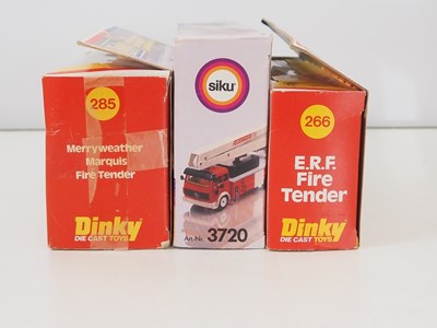 Lot 32 - A group of boxed fire engines by DINKY and...