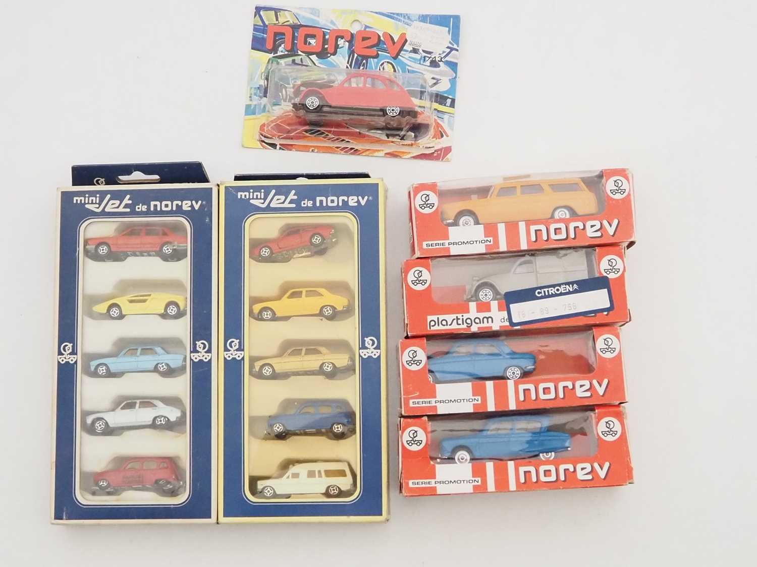 Lot 113 - A group of diecast and plastic cars and vans...