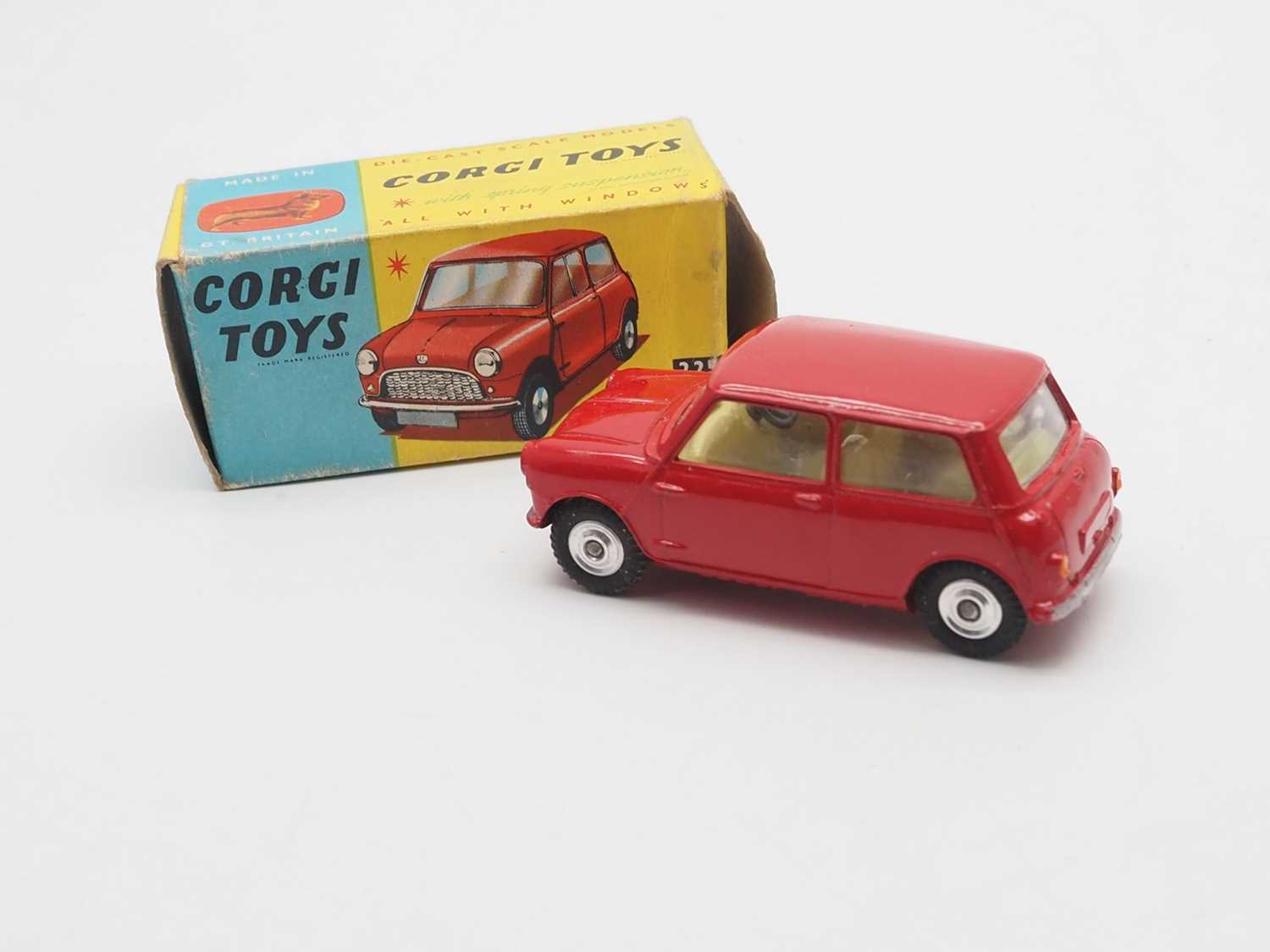 Lot 133 - A CORGI 225 diecast Austin Seven in red - VG...