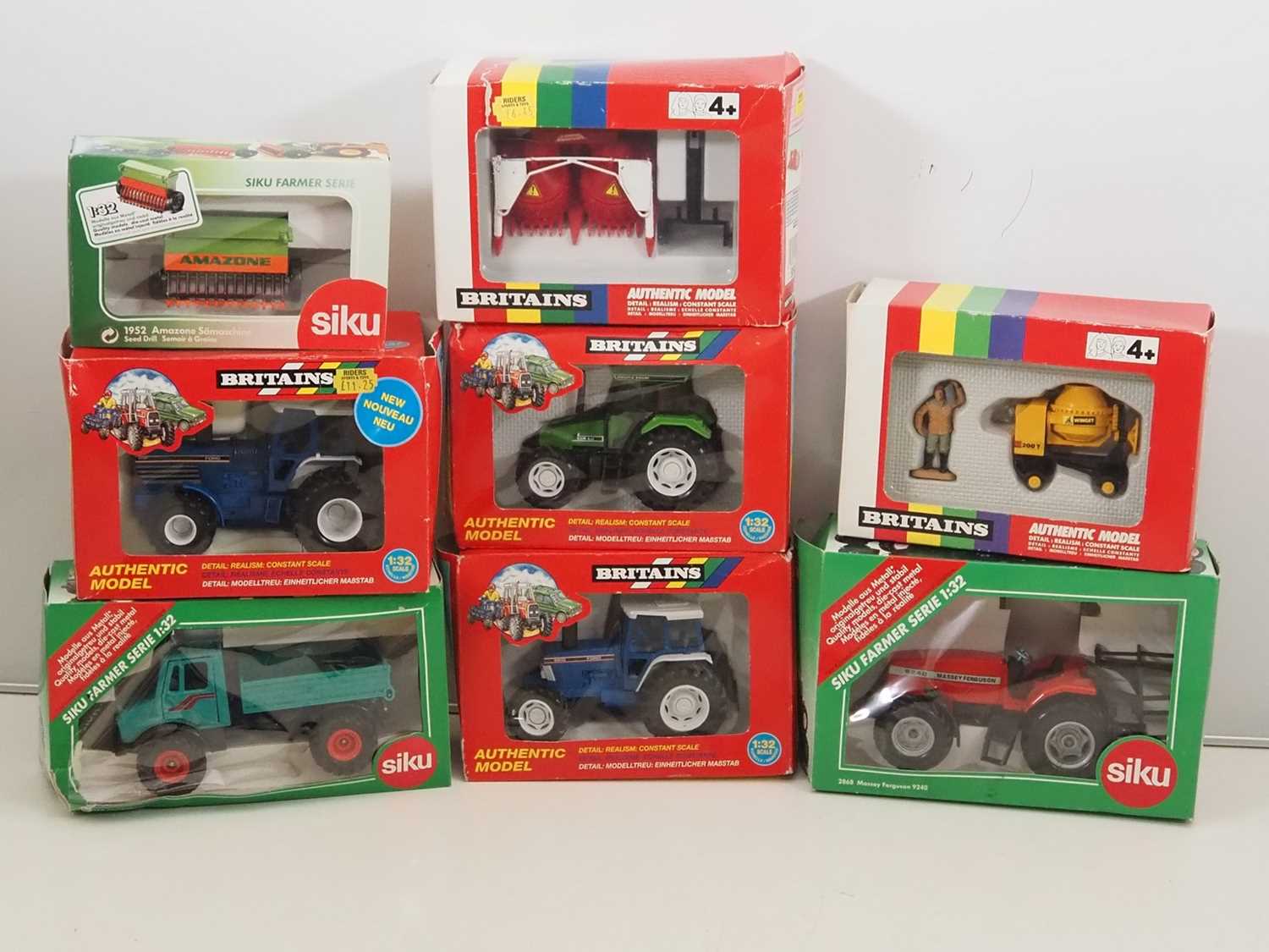 Lot 137 - A group of 1:32 scale diecast tractors and...