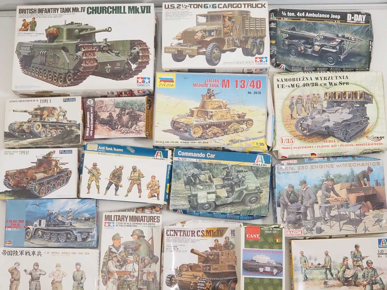 Lot 224 - A group of unbuilt plastic military vehicle...