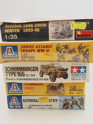 Lot 231 - A group of unbuilt plastic military vehicle...