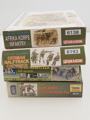 Lot 231 - A group of unbuilt plastic military vehicle...