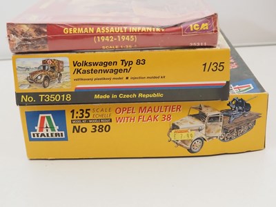 Lot 233 - A group of unbuilt plastic military vehicle...