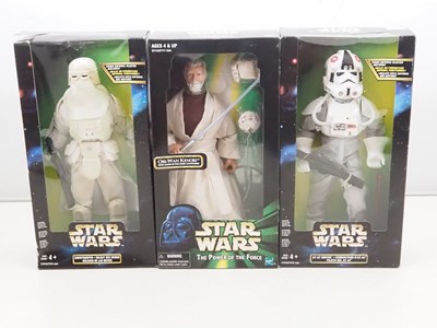 Lot 245 - A group of modern STAR WARS 12" figures in...