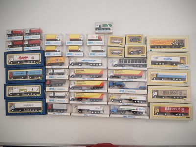 Lot 294 - A quantity of IGRA HO scale plastic cars, vans...