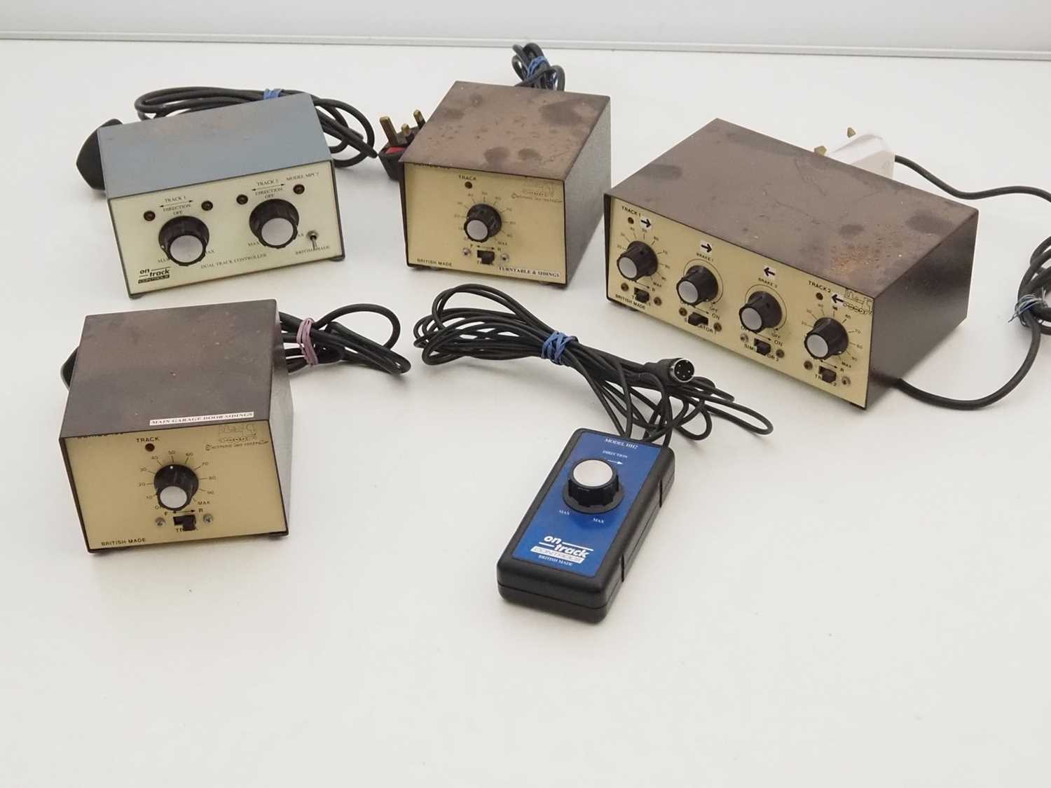 Lot 389 - A group of model railway controllers by...