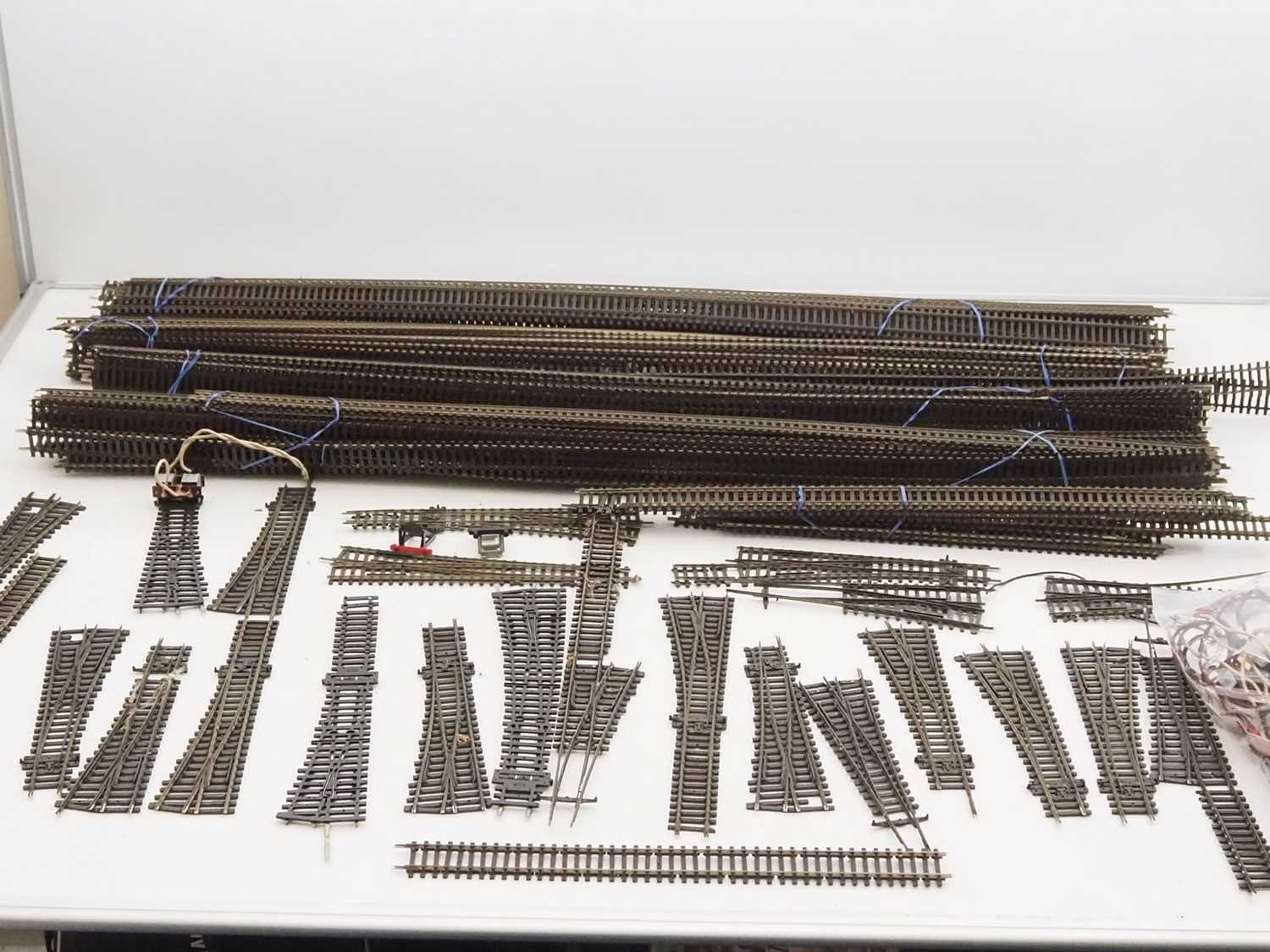 Lot 421 - A large box of OO gauge track to include a...