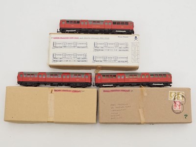 Lot 434 - A group of OO gauge white metal kit built...