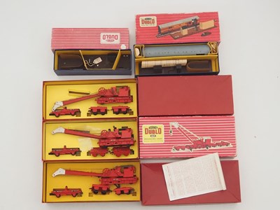 Lot 445 - A group of boxed HORNBY DUBLO OO gauge model...