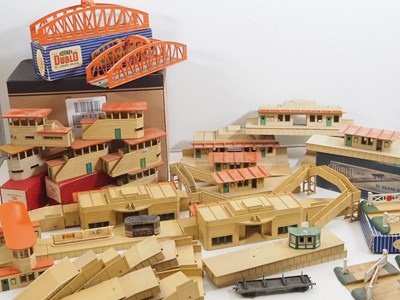 Lot 479 - A pair of large trays of HORNBY DUBLO OO gauge...
