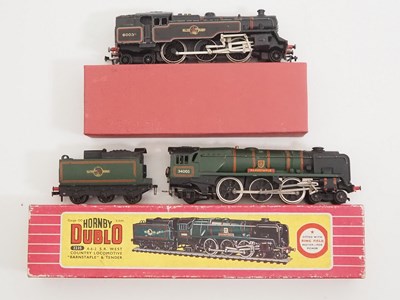 Lot 489 - A pair of HORNBY DUBLO 2-rail OO gauge steam...