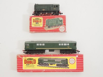 Lot 493 - A pair of HORNBY DUBLO OO gauge 2-rail diesel...