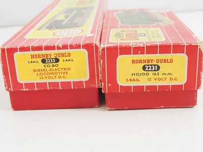 Lot 493 - A pair of HORNBY DUBLO OO gauge 2-rail diesel...