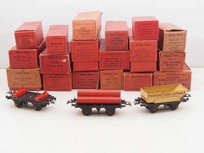 Lot 501 - A large group of HORNBY O gauge clockwork loco,...