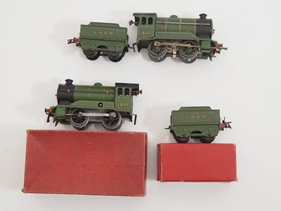 Lot 513 - A pair of HORNBY O gauge No. 501 clockwork...