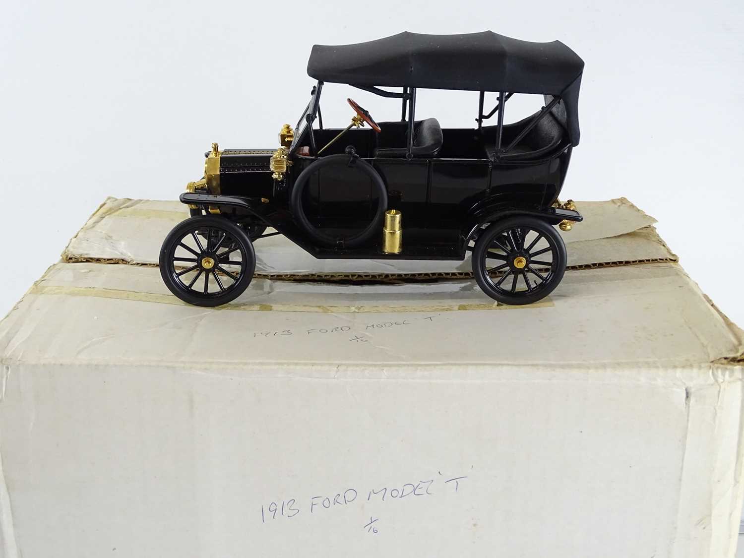 Lot 159 - A pair of FRANKLIN MINT diecast cars