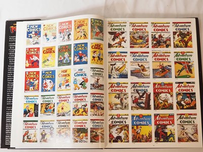 Lot 319 - THE PHOTO-JOURNAL GUIDE TO COMIC BOOKS:...