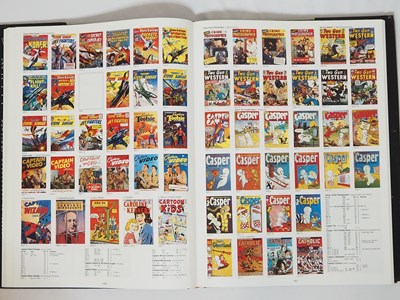 Lot 319 - THE PHOTO-JOURNAL GUIDE TO COMIC BOOKS:...