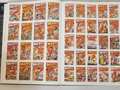 Lot 319 - THE PHOTO-JOURNAL GUIDE TO COMIC BOOKS:...