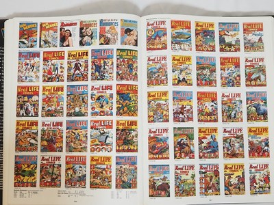 Lot 319 - THE PHOTO-JOURNAL GUIDE TO COMIC BOOKS:...