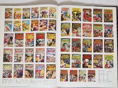 Lot 319 - THE PHOTO-JOURNAL GUIDE TO COMIC BOOKS:...