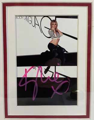 Lot 377 - AUTOGRAPHS - A KYLIE MINOGUE signed display...