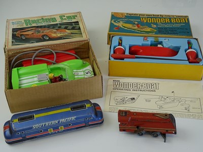 Lot 11 - VINTAGE TOYS: A battery operated MARX racing...
