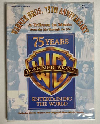 Lot 154 - An autographed copy of 'Warner Bros - A 75th...