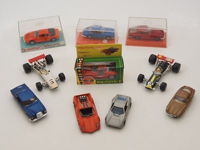 Lot 61 - A quantity of boxed and unboxed diecast cars...