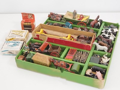 Lot 100 - A large group of diecast farm animals,...