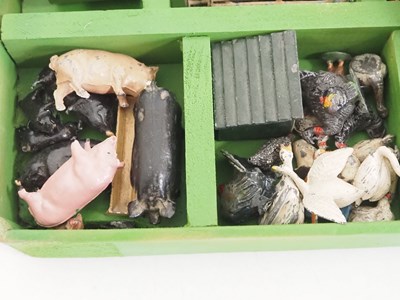 Lot 100 - A large group of diecast farm animals,...