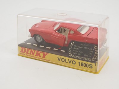 Lot 114 - A pair of DINKY diecast cars in original hard...