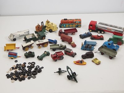 Lot 141 - A selection of diecast and tinplate vehicles...