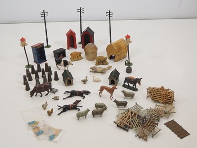 Lot 147 - A quantity of diecast farm animals and other...