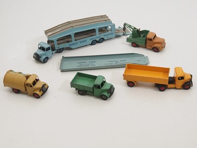 Lot 162 - A group of DINKY trucks and articulated...