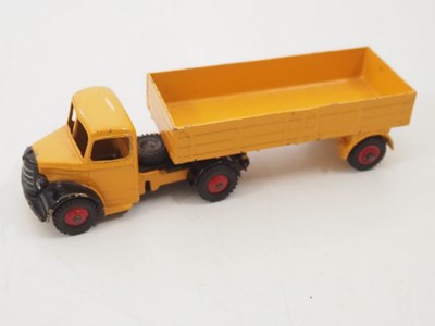 Lot 162 - A group of DINKY trucks and articulated...