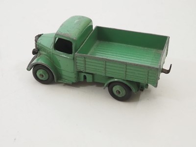 Lot 162 - A group of DINKY trucks and articulated...