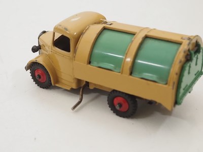 Lot 162 - A group of DINKY trucks and articulated...