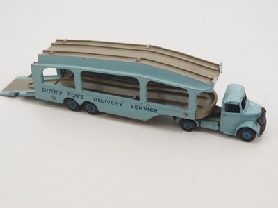 Lot 162 - A group of DINKY trucks and articulated...