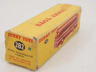 Lot 168 - A group of DINKY diecast buses one in original...