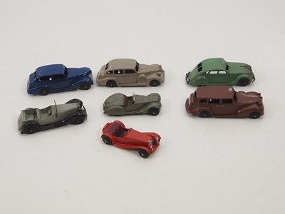 Lot 171 - A group of unboxed DINKY diecast cars to...