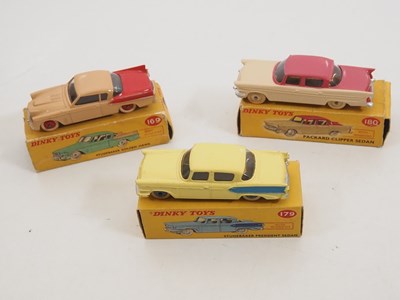 Lot 181 - A group of DINKY TOYS diecast cars comprising...