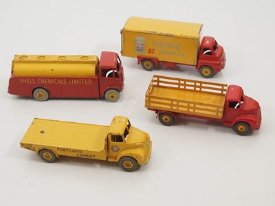 Lot 183 - A group of DINKY diecast lorries and trucks to...