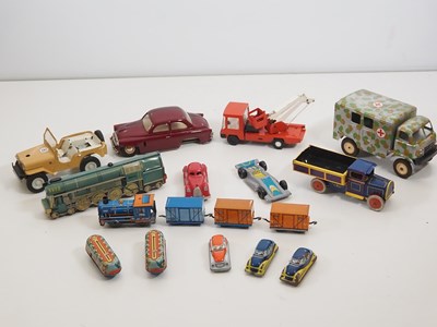 Lot 220 - A tray of vintage tinplate toys mostly Eastern...