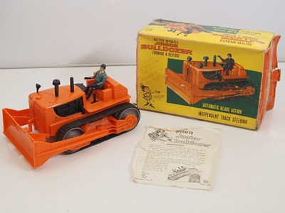 Lot 230 - A LOUIS MARX plastic battery operated junior...