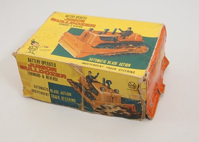 Lot 230 - A LOUIS MARX plastic battery operated junior...