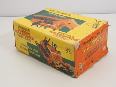 Lot 230 - A LOUIS MARX plastic battery operated junior...