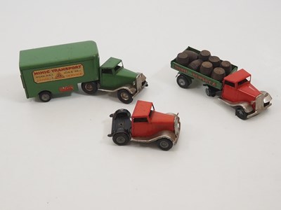 Lot 244 - A pair of vintage TRIANG MINIC clockwork...